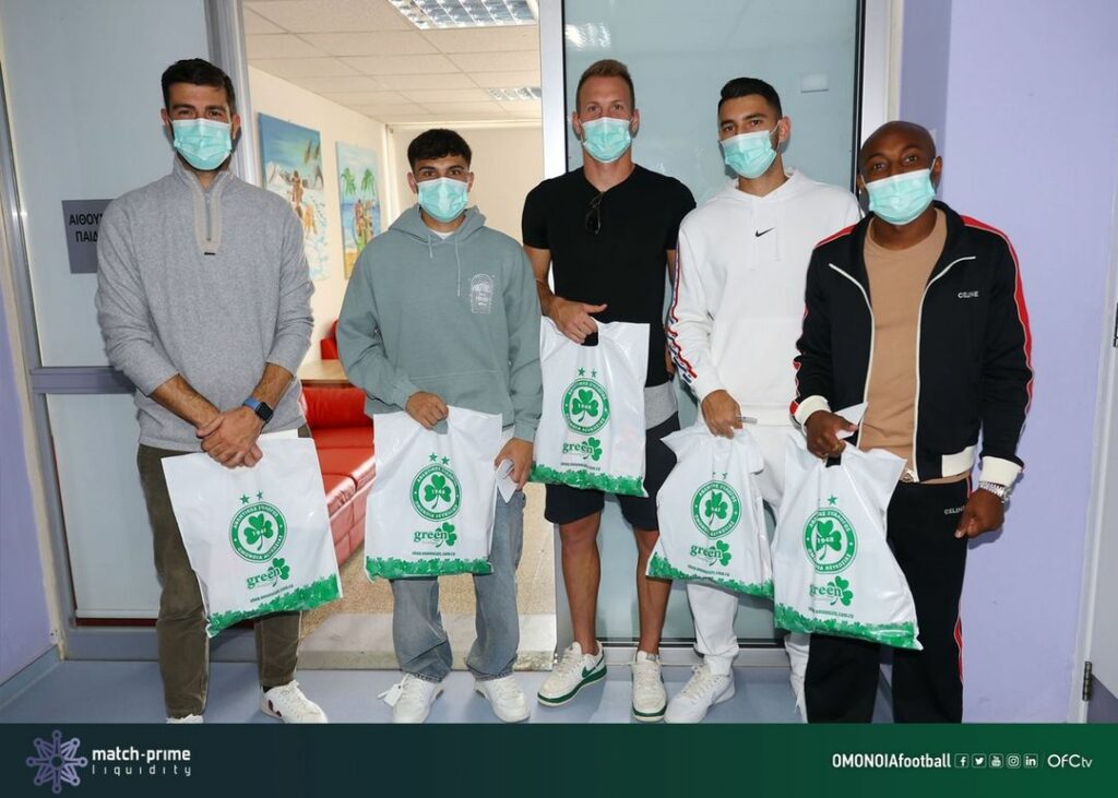 Match-Prime liquidity provider & Omonoia FC visiting children in a hospital on Cyprus